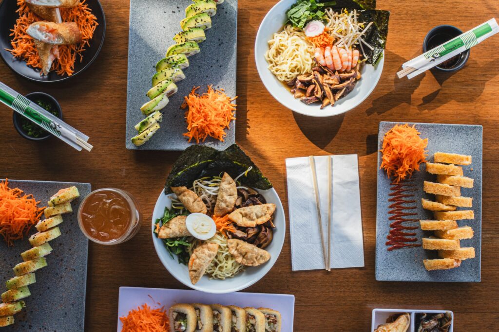 A restaurant table with a range of global cuisine